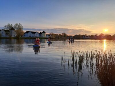 Sunset paddleboarding On Windrush Lake