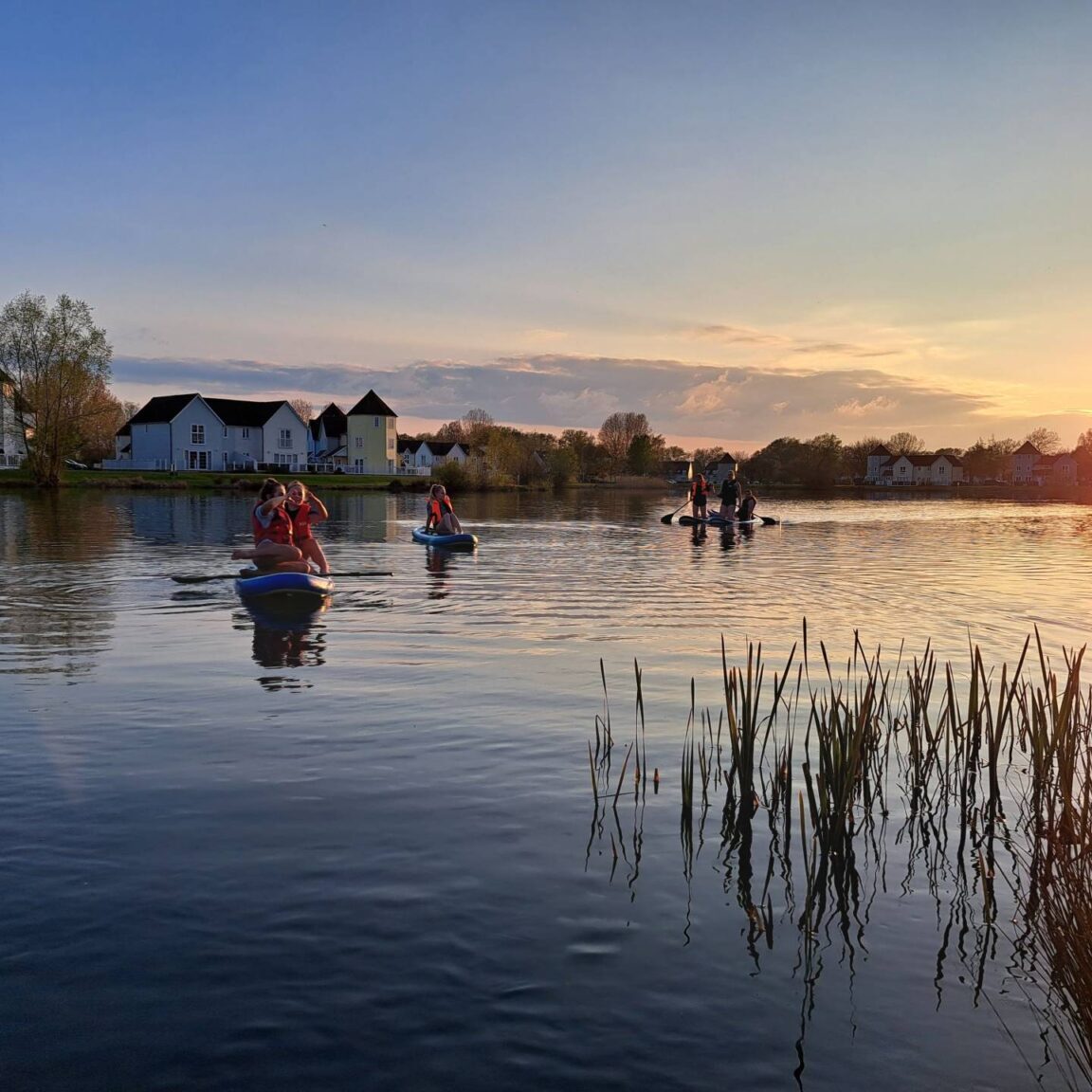 Sunset paddleboarding On Windrush Lake